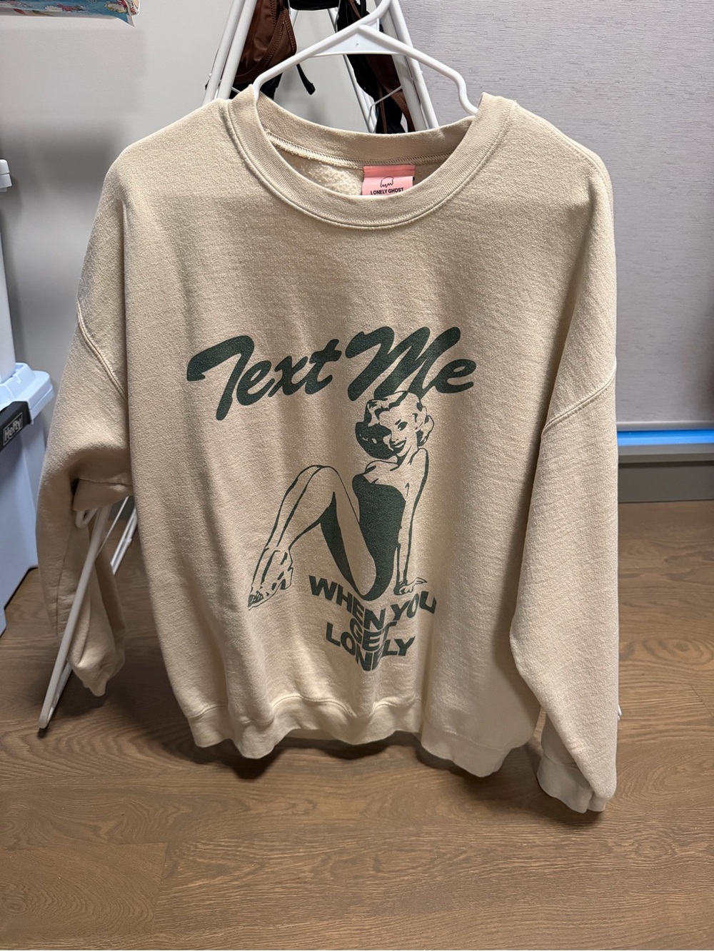 LONELY GHOST Cream Crewneck with Green Retro Pin-Up Graphic